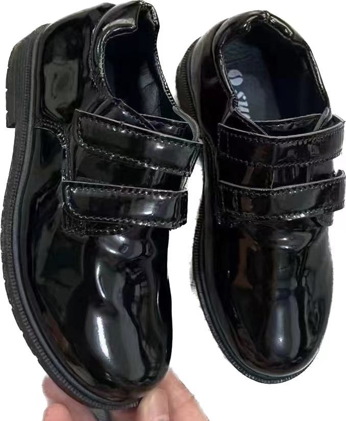 Stockpapa Fashion Kid chaussures en cuir noir vêtements Stock